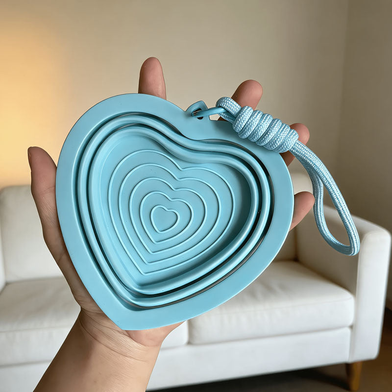 Light blue collapsible pet bowl with rope