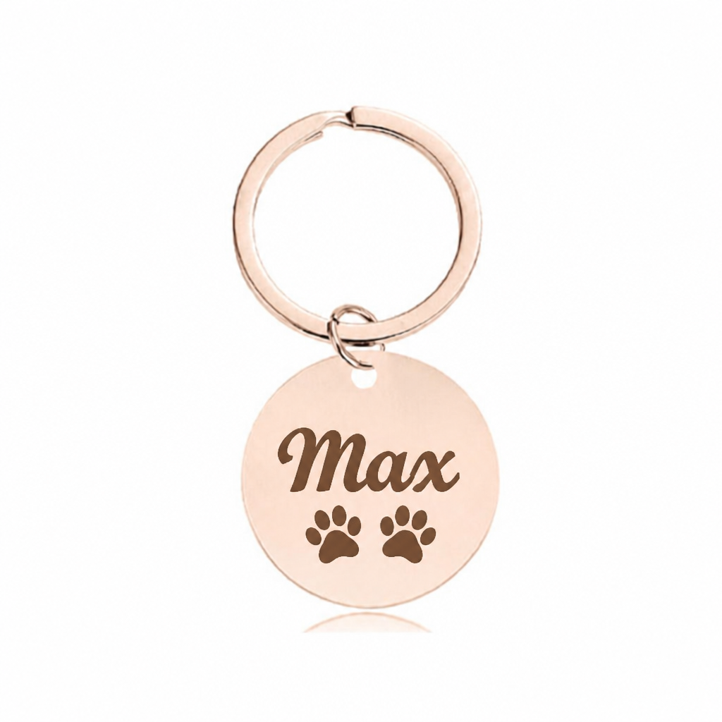Custom dog tag engraved with Max and paw prints - rose gold finish